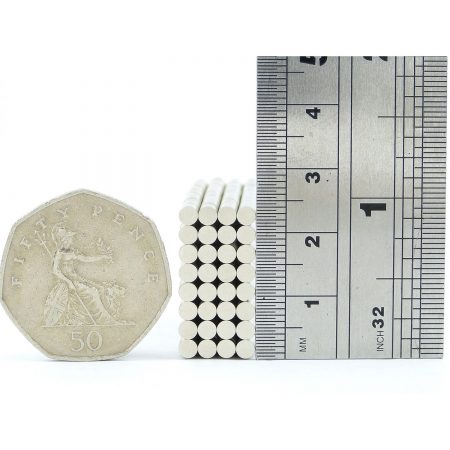3mm x 0.5mm neodymium magnets comparison in size to 50p